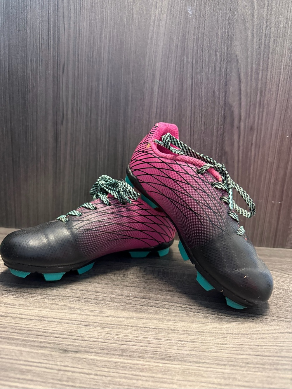 Kids Black and Pink Athletic Cleats